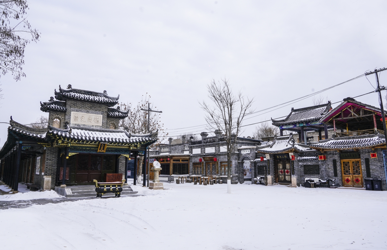 雪后古镇的唯美画卷_永信贵宾会217动态_辽宁永信贵宾会217控股集团